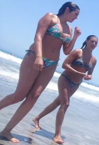 Thick and skinny sexy friends on the beach in bikinis
