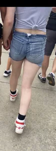 Tight ass in grey jean shorts.
