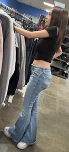 Petite Asian ho showing off tramp stamp & bubble butt