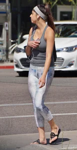 Flat ass brunette walking in leggings with big boobs