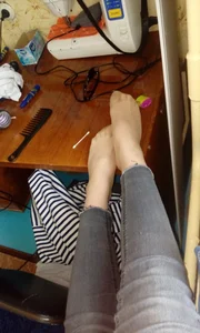 Feet in Pantyhose on Table Home Selfie