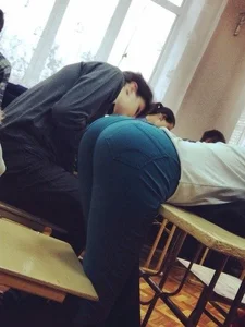 Skinny College Candid Girl Bending Over Desk in Classroom - Booty in Tight Blue Pants Closeup