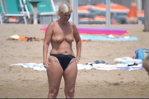 Girls on a nude beach in Bibione, Italy