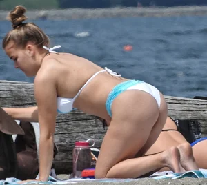 Blondie and two asian girls put on sunscreen (pt 2) [062]