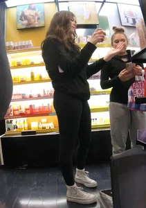 Candid teen in leggings store creepshot