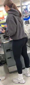 Perfect round ass showing off her long socks and black leggings