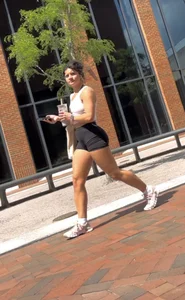 Curly Campus Brunette with amazing Bubble Butt in Tight Shorts (oc)