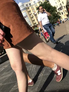 Hot pale legs closeup on the street