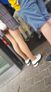 Legs in Pantyhose Street Closeups Gallery - Girl Scratching Her Leg Under Skirt