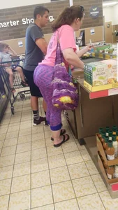 Fat booty milf in purple leggings at the grocery store