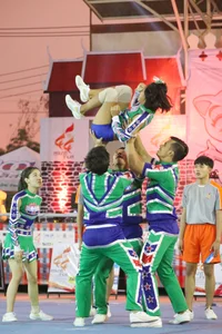 Bunch of athletic Thai cheerleaders at a competition