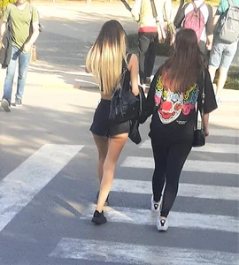 Perfect little booty in mini shorts, cheeks visible