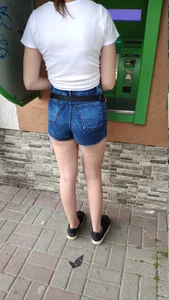 Ass in Blue Denim Shorts and Nice Legs - Girl Using the ATM Creepshot