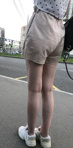 Cute Girl in a Blouse and Shorts With Thin Legs Bus Stop Candid Photo Gallery