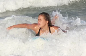 Hot surfer chicks out in the water