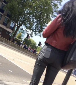 Chav brunette with a nice ass and vpl in tight black leather pants