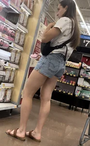 Babe with a  tight ass & long legs in Levi shorts