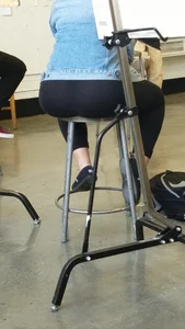 Milf in Tights Sitting on a Stool Ass Closeup