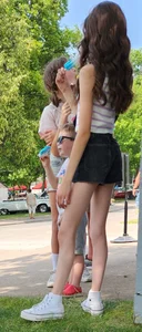 girl sucking on ice cream