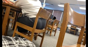 College babe with a nice ass in leggings and sweats at the library