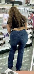 Curly hair lady in jeans @