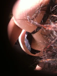Breast under bra peeks