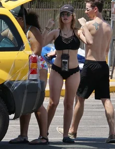 Girls in bikinis getting ready for tubing