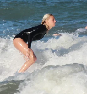 Hot surfer chicks out in the water