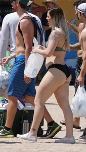 Girls in bikinis getting ready for tubing