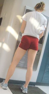 Red shorts and a tasty-looking cameltoe from the back