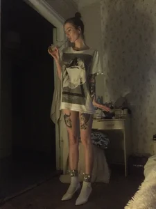 Very Skinny Girl With Tattooed Legs in High Heeled Shoes Home Candid Pic