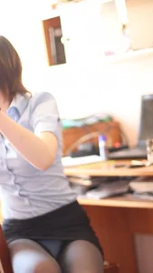 Girl in a Mini-Skirt And Black Pantyhose Accidentally Flashing Her Panties at the Office