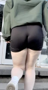 3 girls in black shorts
