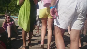 Milf in yellow shorts with vpl and a wedgie