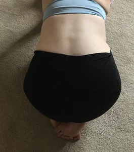 Barefoot Girl in a Top And Spandex Shorts Working Out on the Floor Home Creepshot