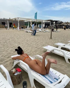 Unsuspecting girls lying on stomach