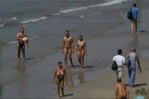 Girls on a nude beach in Sitges, Spain