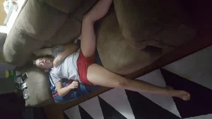 Girl in Red Shorts Asleep on the Couch With Widely Spread Legs Home Creepshot