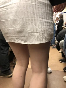 Group of Teens in Short Dresses in a Subway Train and on an Escalator Gallery