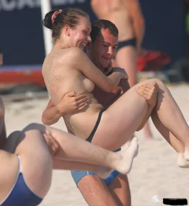 A bunch of sexy beach voyeur babes in bikinis, thongs and topless