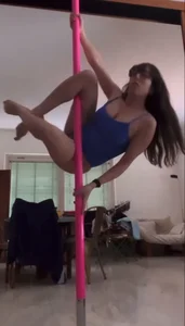 Girl practicing pole dance