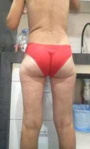 Topless wife in red panties home creepshot at the kitchen
