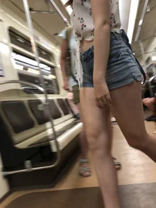 Cute And Slightly Awkward Tall Teen Girl in a Top and Denim Shorts Subway Train Candid Photos