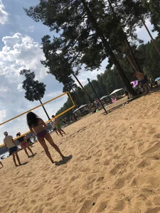 Swimsuit Candid Girl Playing Volleyball at a Beach Gallery