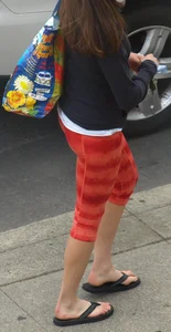 Beautiful brunette teen in orange patterned leggings