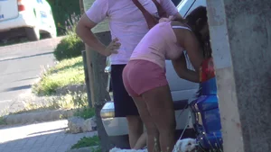 Thick booty babe walking her dogs in pink shorts
