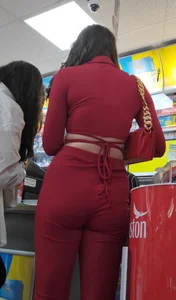 Hot minx in a stunning red outfit