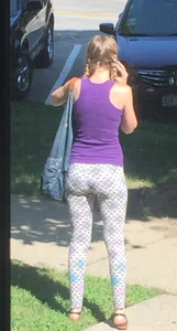 Teen in leggings with braided hair