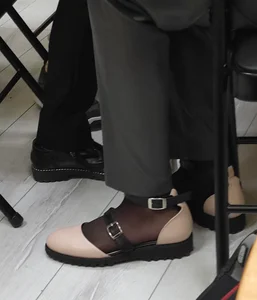 Closeups of a Candid College Teen's Feet in Black Pantyhose And Boots, Sitting in Class