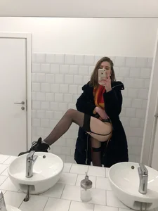 Sexy Mirror Toilet Selfie in Stockings and a Coat